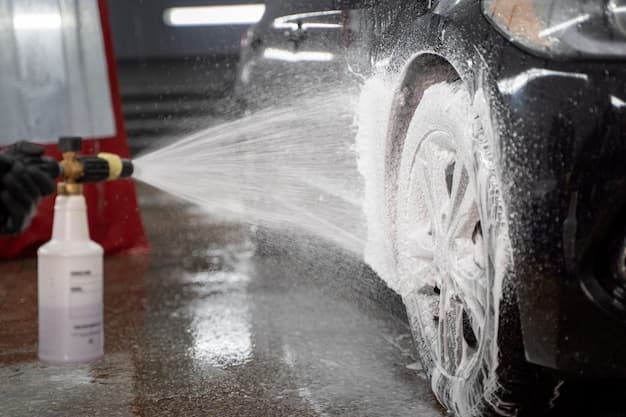 Car technician working in garage